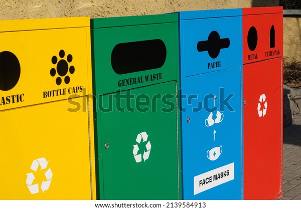 Containers for recycle paper, plastic, masks in a\
different colours