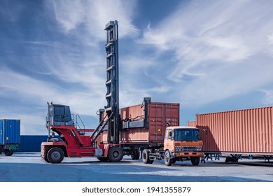 Containers warehouse storage at shipyard loading distribution goods by forklift truck transport delivery export commerce global business.