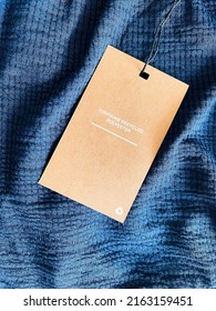 Contains Recycled Polyester Fashion Label Tag, Sale Price Card On Luxury Fabric Background, Shopping And Retail Concept