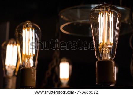 Contamplorary LED light bulds made to look like old school edison style light bulbs. Creating old style look and saving energy.