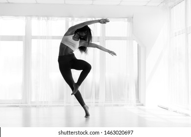 Contemp Girl Dancing In Modern Dance Class. Black And White, Free Space