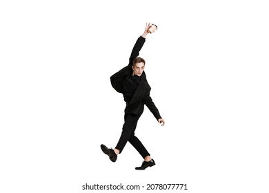 Contemp. Young Man In Black Business Suit Dancing Isolated On White Background. Art, Motion, Action, Flexibility, Inspiration And Ad Concept. Flexible Ballet, Contemporary Dancer Weightless Moves