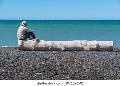 Contemplating at the beach