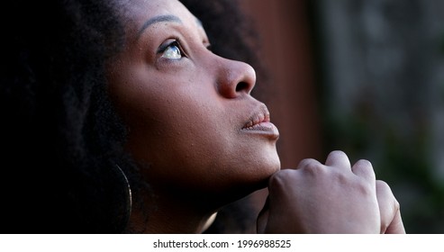 Contemplative African woman thinking, close-up black person face thoughtful - Powered by Shutterstock