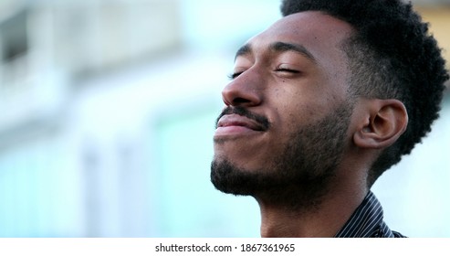 Contemplative Young African Black Man Eyes Closed In Mindful Meditation