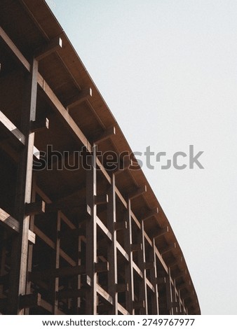 Contemporary architecture with angular timber balconies perspective