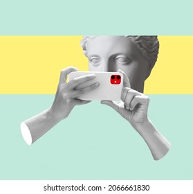 Contemporary art collage with antique statue head in a surreal style and hands holding a smartphone. Modern conceptual art poster 