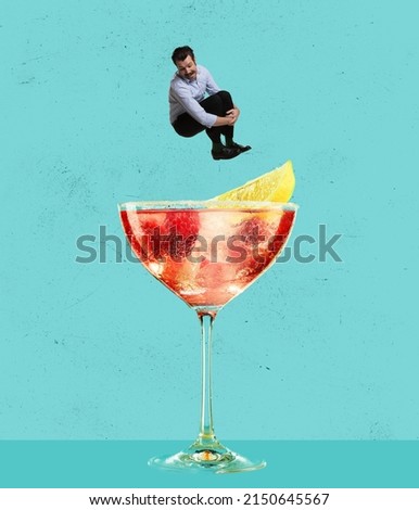Contemporary art collage. Happy cheerful man jumping into refreshing tasty cocktail with fruity taste isolated over blue background. Concept of alcohol, addiction, party, taste. Pop art style, ad