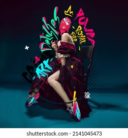 Contemporary artwork. Medieval royal woman, princess in renaissance dress, modern sneakers and balaclava isolated over dark background. Combination of modernity and past. Street style lettering design