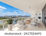 Contemporary Balcony Photoshoot located in Florida, USA. Showcasing modern architectural design and development. Beautiful clear Skyline, commercial area view with canals and beach.