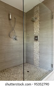 Contemporary Bathroom Shower With Dual Shower Heads And Glass Enclosure.