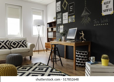 Contemporary big city's flat with decorative items and furniture in natural colours - Powered by Shutterstock