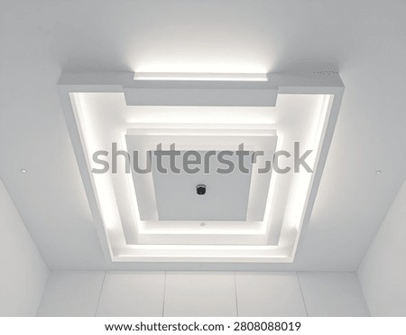 A contemporary ceiling installation featuring a multi-tiered square design with illuminated LED strips creating a bright and sophisticated ambiance.