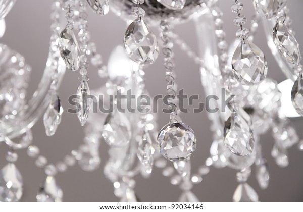 Contemporary Crystal Chandelier. Close up on\
the crystal of a contemporary\
chandelier.
