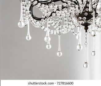 Contemporary Crystal Chandelier In Room Interior. Close Up