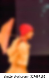 Contemporary dance performance blur background with shallow depth of field bokeh effect