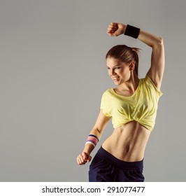 Contemporary dancer. Portrait of young active female exercising zumba dance in class with space for text. 