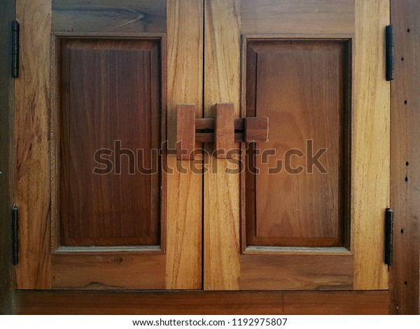 Contemporary Door Handle On Closed Solid Stock Photo Edit