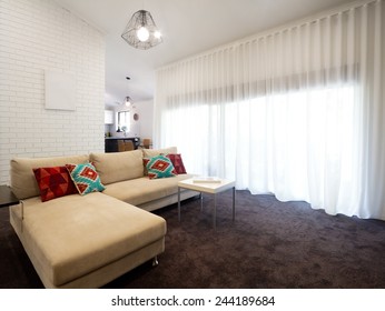 Contemporary Home Living Room With Sheer Curtains