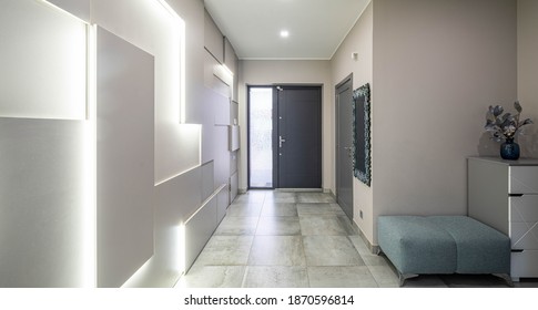 Contemporary Interior Of Entrance Hall In Luxury Apartment. Modern Design Of Wall.