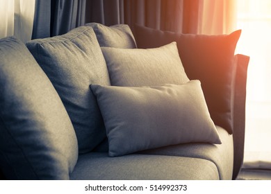 contemporary interior of Living room with part of sofa in sunny day and white curtain interior background concept - Shutterstock ID 514992373
