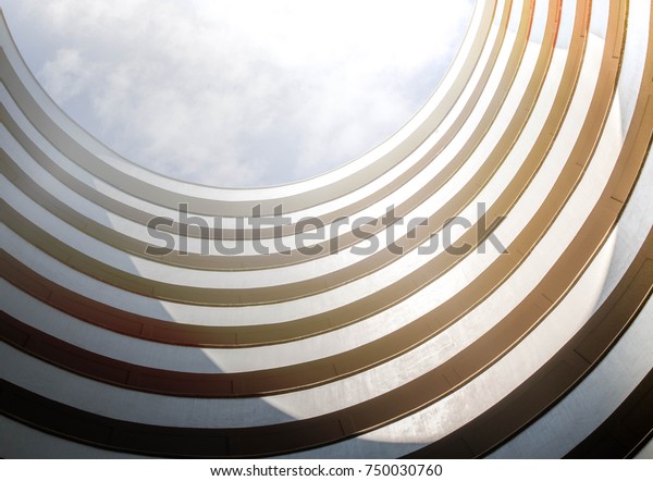 Contemporary Modern Circle Building Sun Flarelayers Stock Photo