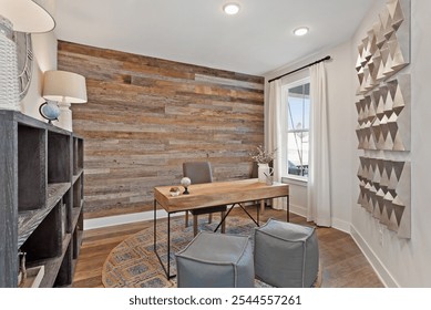 Contemporary office with wood accent wall, minimalist desk, gray chair, and geometric wall art. Warm tones and natural textures give this stylish workspace a cozy, rustic feel. - Powered by Shutterstock