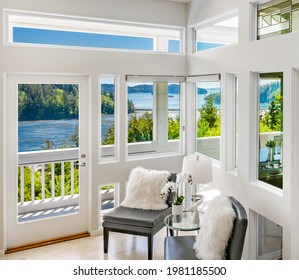 Contemporary Pacific Northwest Home With Blue Sky And Water Views Bright White Interior