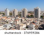Contemporary residential buildings and houses in new neighborhood of Kiryat Gat, Israel.