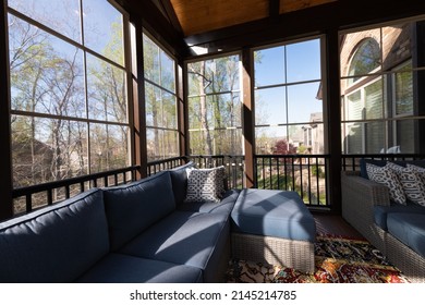 Contemporary Screened Porch In Springtime, Full Of Blooms Trees In The Background. New Home Addition Concept.