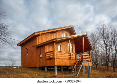 Contemporary Wooden Single Family House. Retreat Rental. Perfect Getaway. Wooden House On A Island With Oaks. Organic Architecture. Wooden Minimalistic House With Big Panoramic Windows. 