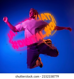 Contemporay artwork. Young man with neon lettering around body dancing isolated over blue background in neon light. Concept of digitalization, artificial intelligence, technology era