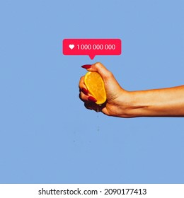 Contemporray art collage of female hand squeezing lemon and having one million like icon isolated over blue background. Concept of social media, influence, popularity, modern lifestyle and ad