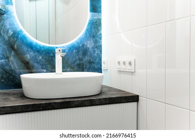 Contemprary bathroom interior with light mirror and sink table
Stylish bath design visualisation in white color
