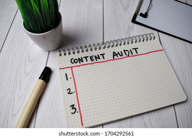 Content Audit Write On A Book Isolated On Office Desk