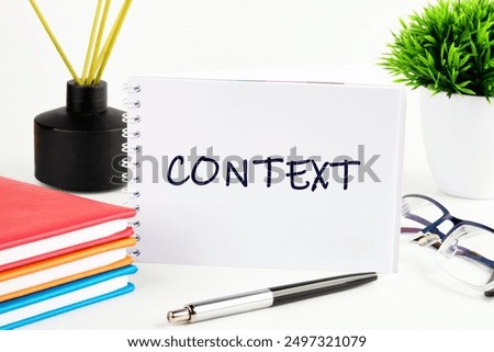 Content. Business and content and context concept. Text CONTEXT in a notebook on a light background in a composition with business accessories