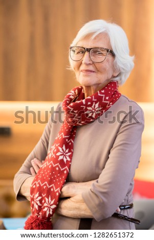 Similar – Image, Stock Photo Elderly woman in yellow top with a warm smile