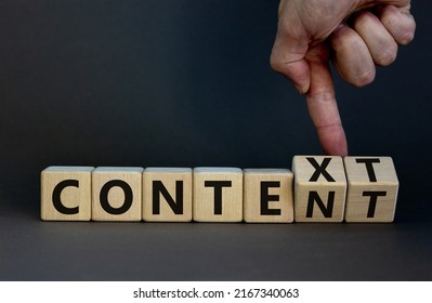 Content and context symbol. Businessman turns wooden cubes and changes the word context to content. Beautiful grey table, grey background. Business and content and context concept. Copy space. - Shutterstock ID 2167340063