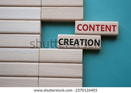 Content creation symbol. Concept word Content creation on wooden blocks. Businessman hand. Beautiful grey green background. Business and Content creation concept. Copy space