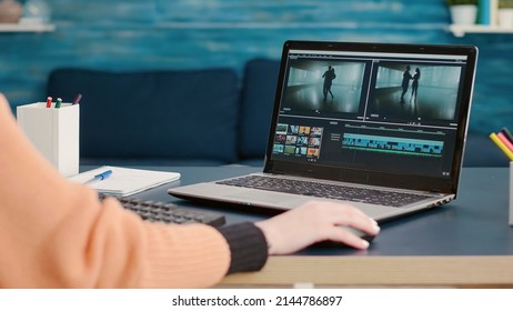 Content creator editing video montage on film production software, using laptop to learn for online class course. Student working on movie making development, creating multimedia footage. - Shutterstock ID 2144786897
