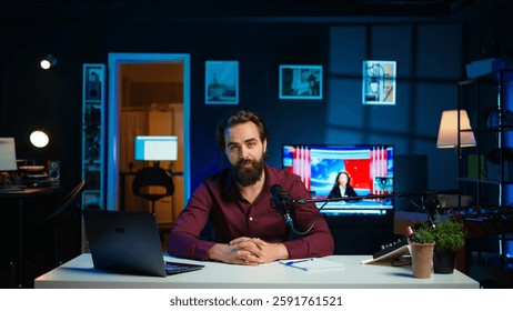 Content creator using mic in studio to do ASMR video, discussing with viewers using soothing voice. Man using professional microphone to record podcast with crisp sound, camera B