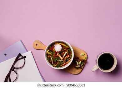 Content Of The Lunch Break. Cold Traditional Russian Soup, Okroshka With Kvass, Perfectly Refreshes And Quenches Thirst. A Bowl Of Soup On A Wooden Stand, Business Papers And Reading Glasses. Overhead