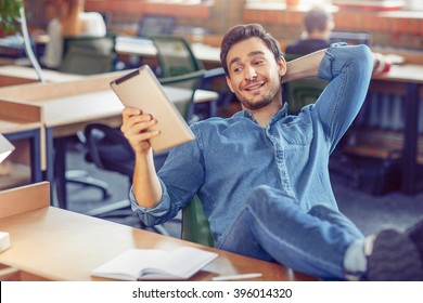 Content man sitting at the table 