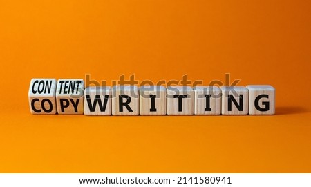 Content writing or copywriting symbol. Turned cubes and changed concept words content writing to copywriting. Beautiful orange background copy space. Business Content writing or copywriting concept.