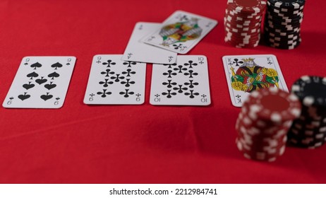 A contentious round in texas holdem poker.

Flush against full house. - Shutterstock ID 2212984741