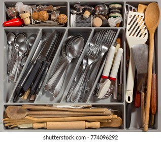 Contents Of A Kitchen Drawer Full Of Cutlery And Utensils