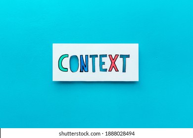 Context marketing concept. Word Context on paper banner, top view