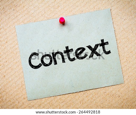 Context Message. Recycled paper note pinned on cork board. Concept Image