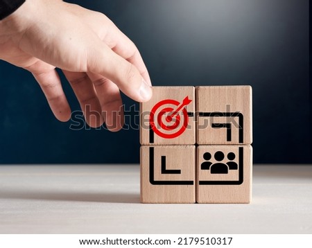 Contextual advertising, customer targeting, personalized marketing, marketing strategy and social network advertising concept. Wooden cubes with target and client group icons.