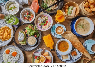 Continental breakfast captured from above top view, flat lay. Coffee, orange juice, croissants, jam, honey and corn flakes. Black and white stone worktop as background - Powered by Shutterstock